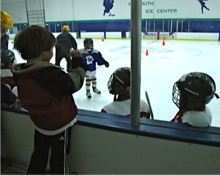 Jack watches Aidan at hockey practice